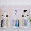 Présentoir à vêtements mural Dareld