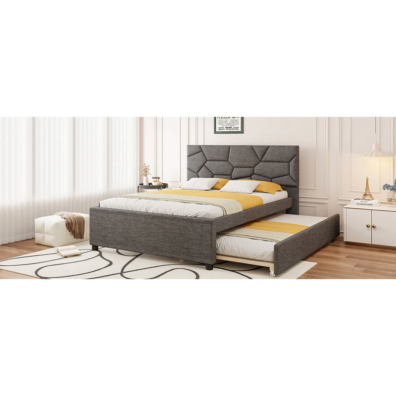 Lit plateforme tapissier très grand en lin gris et lit simple TG avec tête de lit à motif brique, lit stable, structure en bois