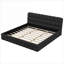 Lit plateforme tapissier très grand à silhouette moderne et minimaliste noir mat sans sommier