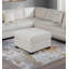 Canapé d'angle en velours côtelé beige en forme de L avec accoudoirs, coussins et pouf de cocktail