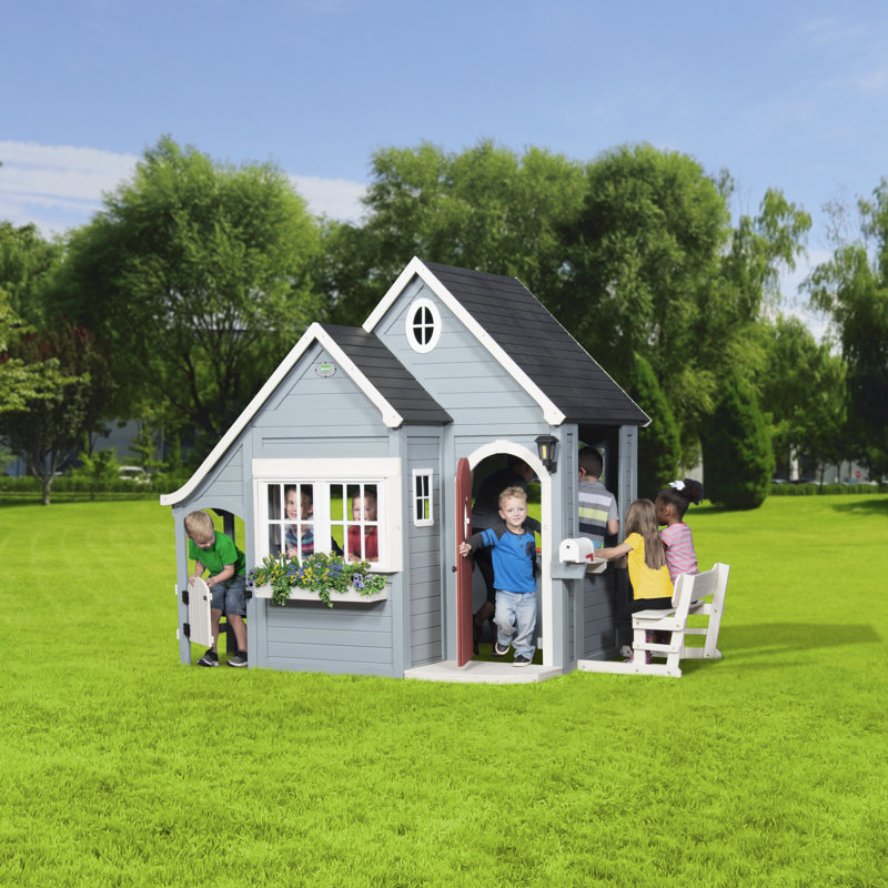 Backyard Discovery 170.2cm W x 279.4cm D Outdoor Cedar Wood Playhouse with Kitchen