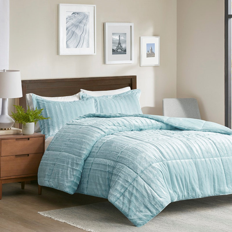 Édredon en fausse fourrure bleu sarcelle, texture magnifique, charmante grâce