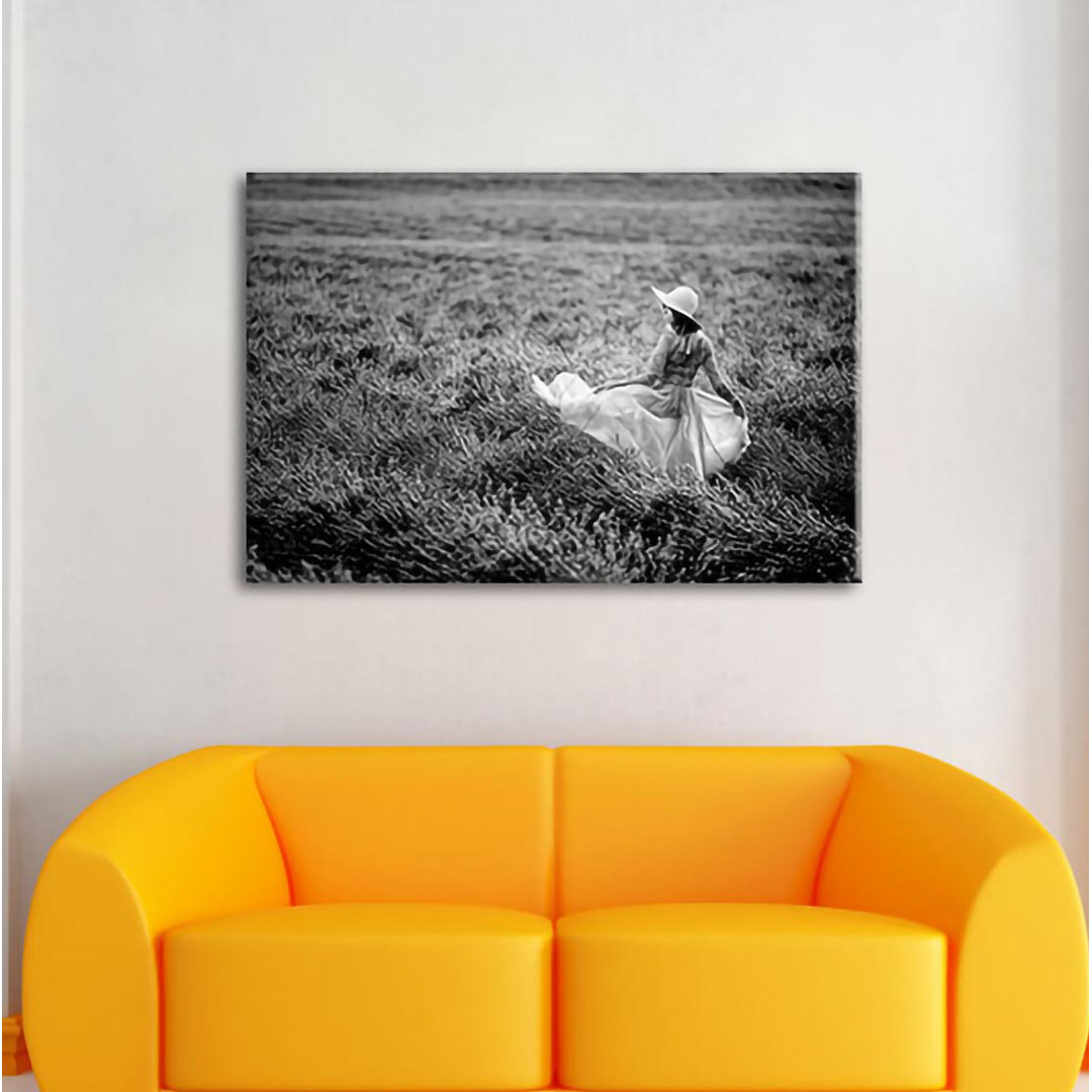 Leinwandbild Woman in Dress Running Through Lavender Field