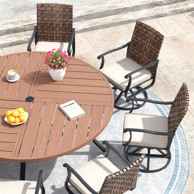 Ensemble repas pour 8 personnes avec table ronde de 60 po et 8 chaises et coussins pivotants en rotin de polyéthylène