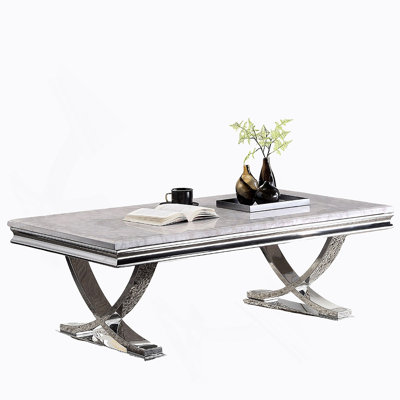 Modern Glam Style Coffee Table With Faux Marble Top And Chrome Pedestal Base, Perfect For Luxurious Living Spaces.