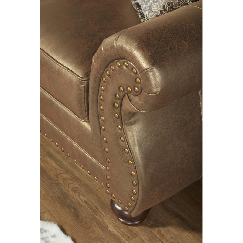 Canapé moderne en similicuir avec têtes de clou bronze antique