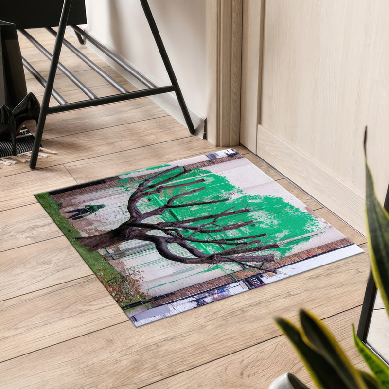 Soft Non-Woven Printed Rug Featuring a Floral Pattern and Intricate Border Design in Earth Tones for a Warm Traditional Touch to Your Living Room or Study