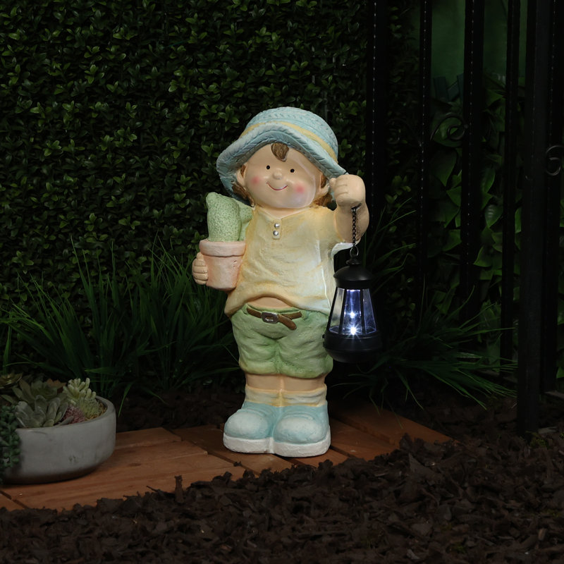 17"H Boy Holding Lantern Solar Statue with LED Lights