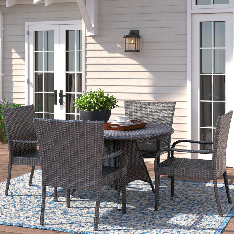 Andhav 4 - Person Patio Dining Set Umbrella Hole Included Round Table
