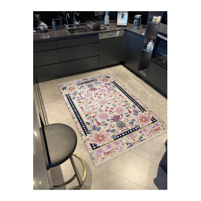 Tapis rose lavable à la machine à motif floral multicolore