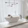 69.3"L x 33.5"W x 21.7"H Solid Surface Freestanding Oval Tub with Overflow and Drain