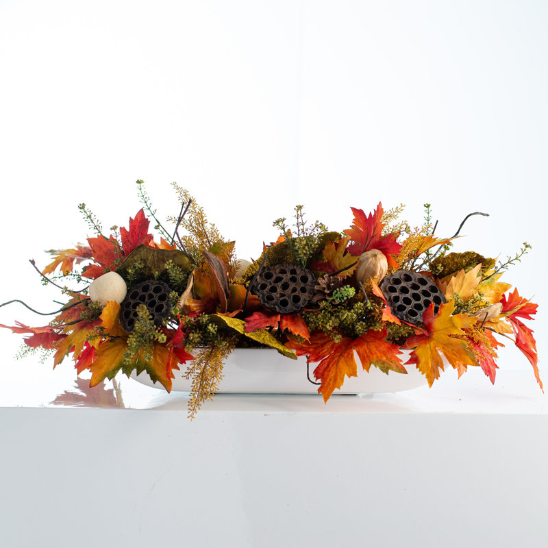 Arrangement floral mélangé dans un vase