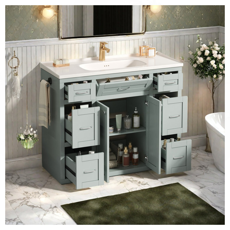 Meuble-lavabo 48 po vert menthe avec lavabo en céramique - 6 tiroirs (3 de chaque côté), tiroir central rabattable, portes doubles à fermeture en douceur, porte-serviettes latéral réversible, poignées argentées, panneau de fibres à densité moyenne
