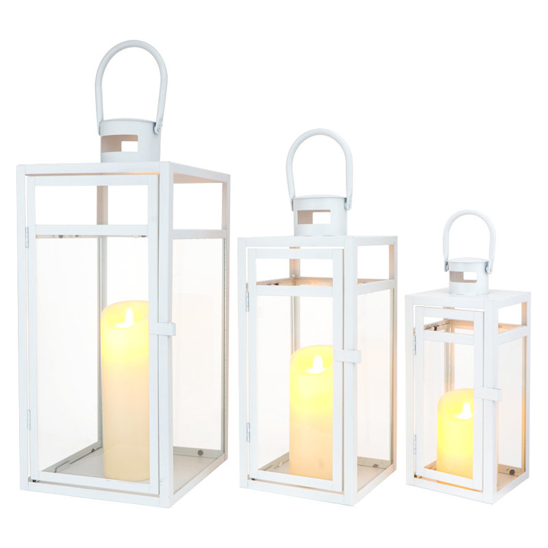 Ensemble de trois porte-bougies de table en acier inoxydable et verre transparent et blanc