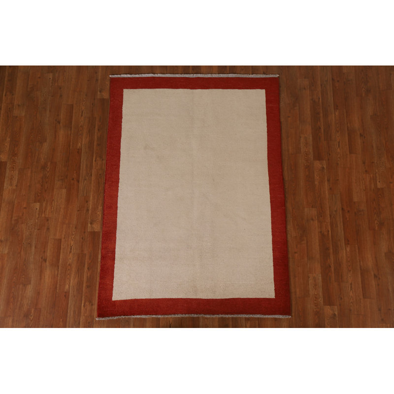 Tapis unique en laine beige 4 pi x 5 pi 8 po One Age
