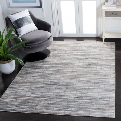 Tapis géométrique gris / ivoire