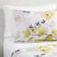 Édredon enchanteur avec draps - Grandes feuilles jaunes et grises de style chic