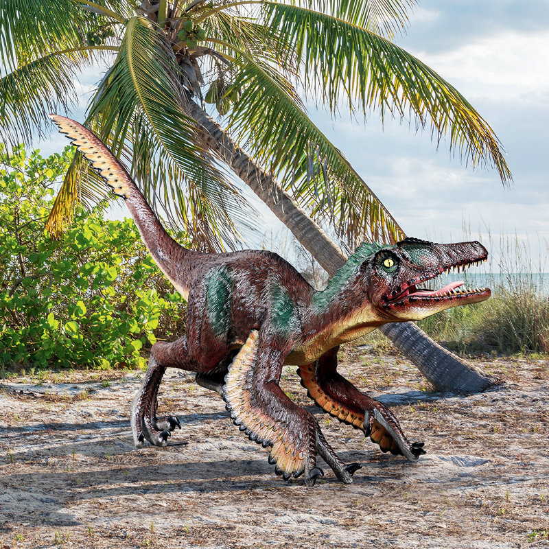 Statue de velociraptor à plumes