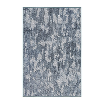 Tapis bleu tissé à la machine
