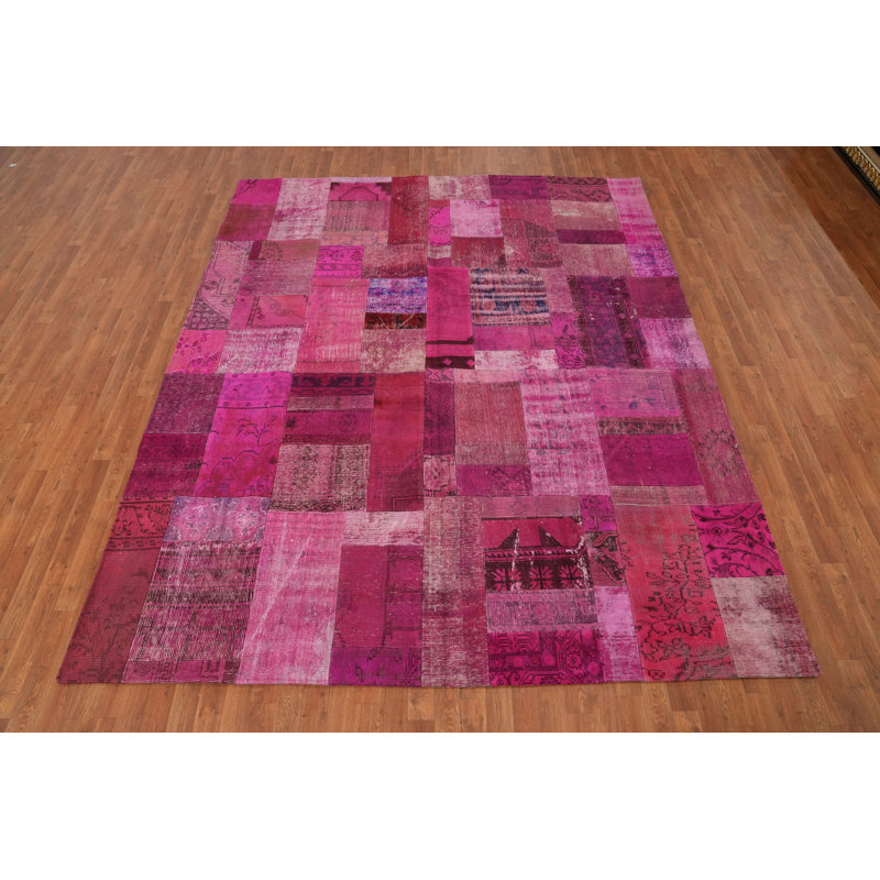 Tapis fuchsia rose en laine à motif patchwork 8 x 10