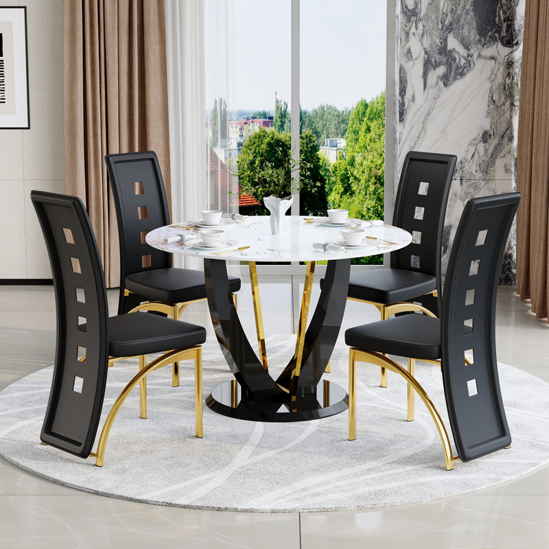 Ensemble de salle à manger rond noir et doré avec plateau en faux marbre et chaises en similicuir, 5 pièces: table, 4 chaises