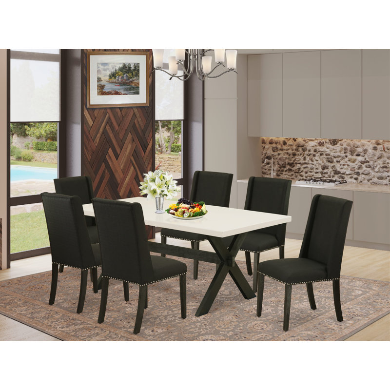 Ensemble de mobilier de salle à manger 7 pièces composé d'une table de salle à manger rectangulaire avec pieds en X et 6 chaises Parsons en tissu noir, noir brossé