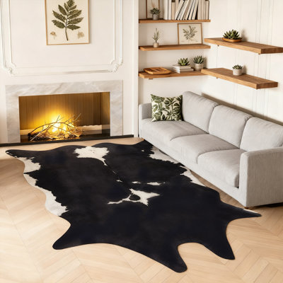 Faux leather animal print area rug for indoor use, suitable for living rooms, bedrooms, and studies.