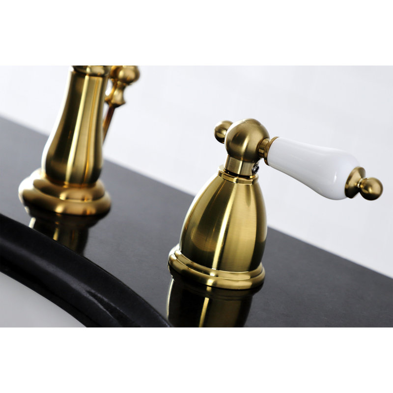 Kingston Brass Heritage Two-Handle 3-Hole Deck Mount Widespread Bathroom Faucet with Brass Pop-Up Drain, Satin Brass