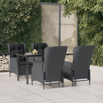 Finan Rectangular 4 - Person 63" Long Dining Set with Cushions