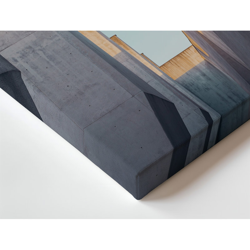 Toile une scène architecturale minimaliste mettant en vedette une série de grandes œuvres d'art murales angulaires en béton, leurs surfaces lisses et l'art mural sur toile