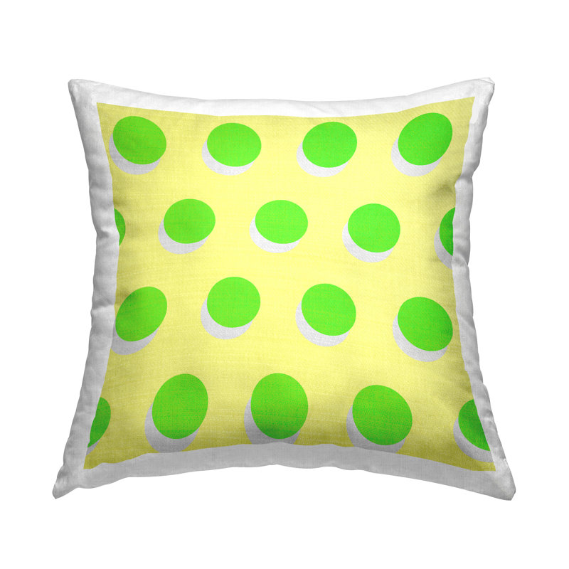 Coussin décoratif à pois vert sur fond jaune par Daphne Polselli