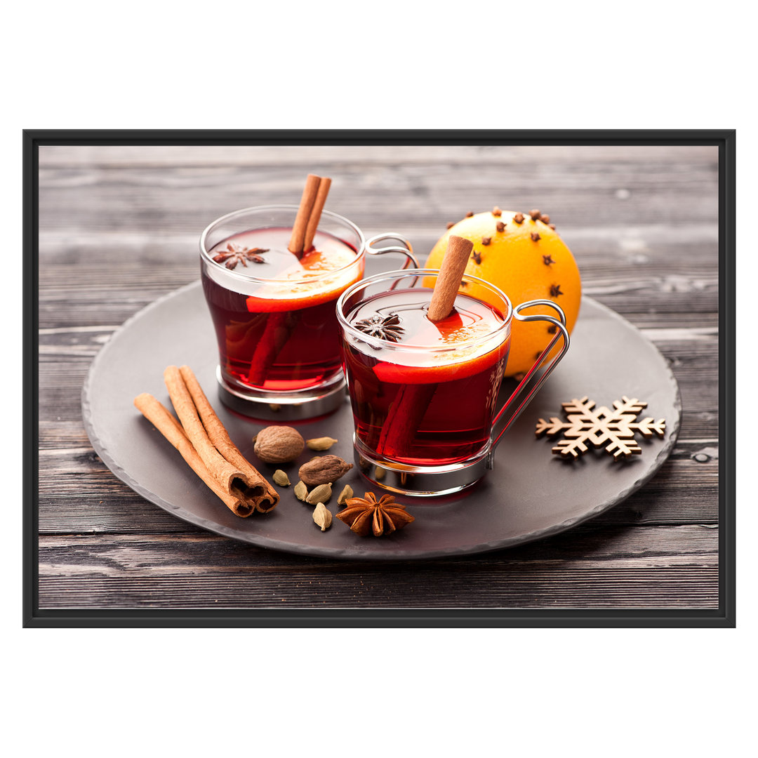 Gerahmtes Wandbild Aromatischer Glühwein mit Zimt