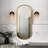Eugie 1-Light Black & Gold Dimmable Wall Sconce with Seeded Glass for Damp Indoor