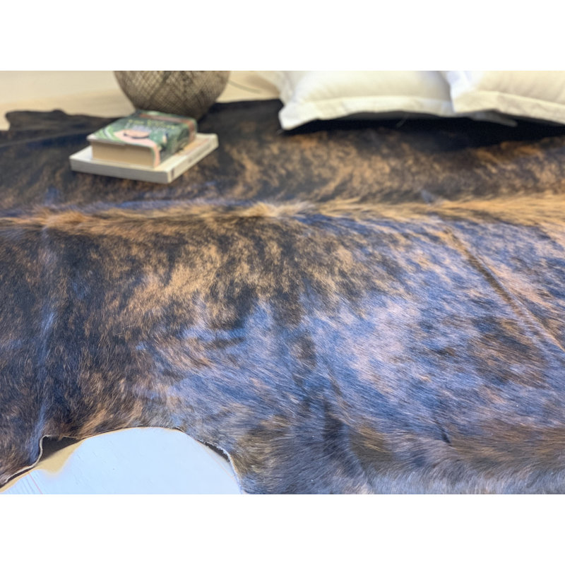 Tapis bringé en peau de vache véritable Niantic