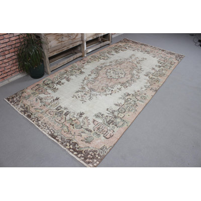 Elegant Vintage Turkish Area Rug in Soft Pink and Ivory Tones Featuring Floral Medallion Design for Stylish Home Decor and Floor Enhancement