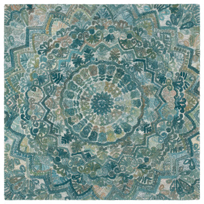 Tapis floral en laine touffeté à la main de couleur turquoise / vert Loura