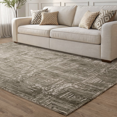 Brenetta Geometric Shapes Green Area Rug