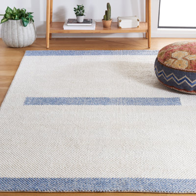 Tapis en laine tissé à plat à la machine en ivoire / bleu