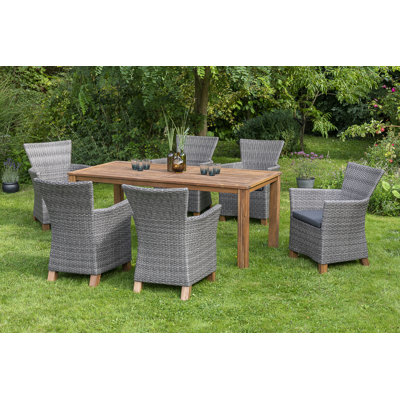 Irby 6 - Person Acacia Solid Wood Patio Dining Set Rectangular Table with Cushions Included