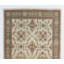 Tapis à motif floral fait à la main