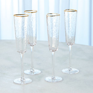 https://assets.wfcdn.com/im/98110395/resize-h310-w310%5Ecompr-r85/1714/171436581/hammered-champagne-glass-clear-wgold-rim-set-of-4.jpg