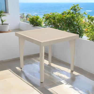 Plastic/Resin Patio Dining Table by Latitude Run