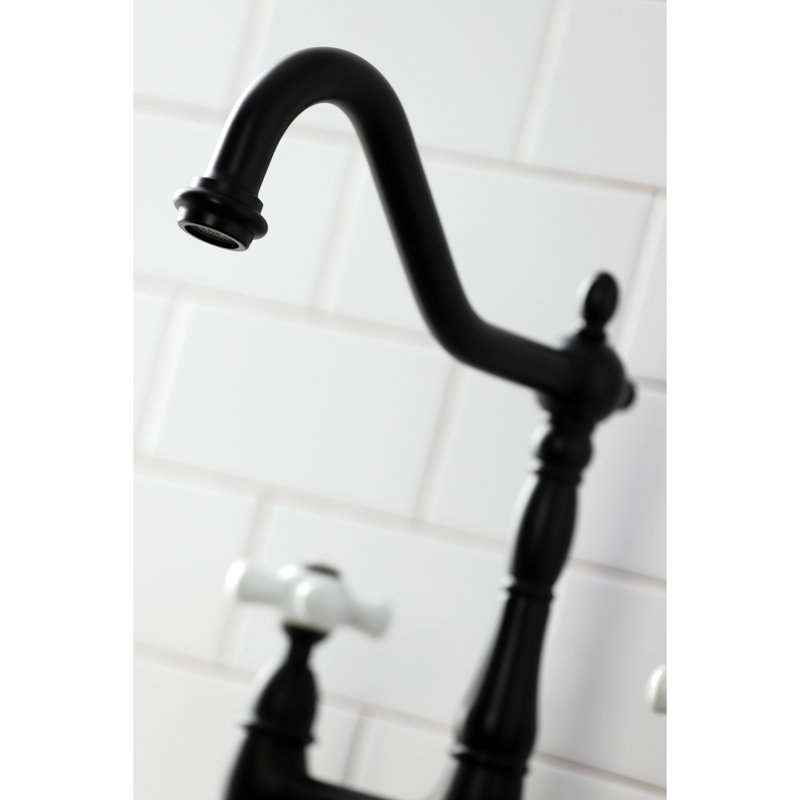 Kingston Brass Heritage Two-Handle 4-Hole Deck Mount Bridge Kitchen Faucet with Brass Side Sprayer, Matte Black