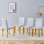 Ensemble de 4 chaises d'appoint avec revêtement en polyuréthane gris classique et pieds en métal doré, sièges confortables pour la salle à manger