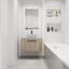 Meuble-lavabo de conception moderne avec lavabo en céramique et porte à fermeture en douceur, fixé au mur pour un look élégant.