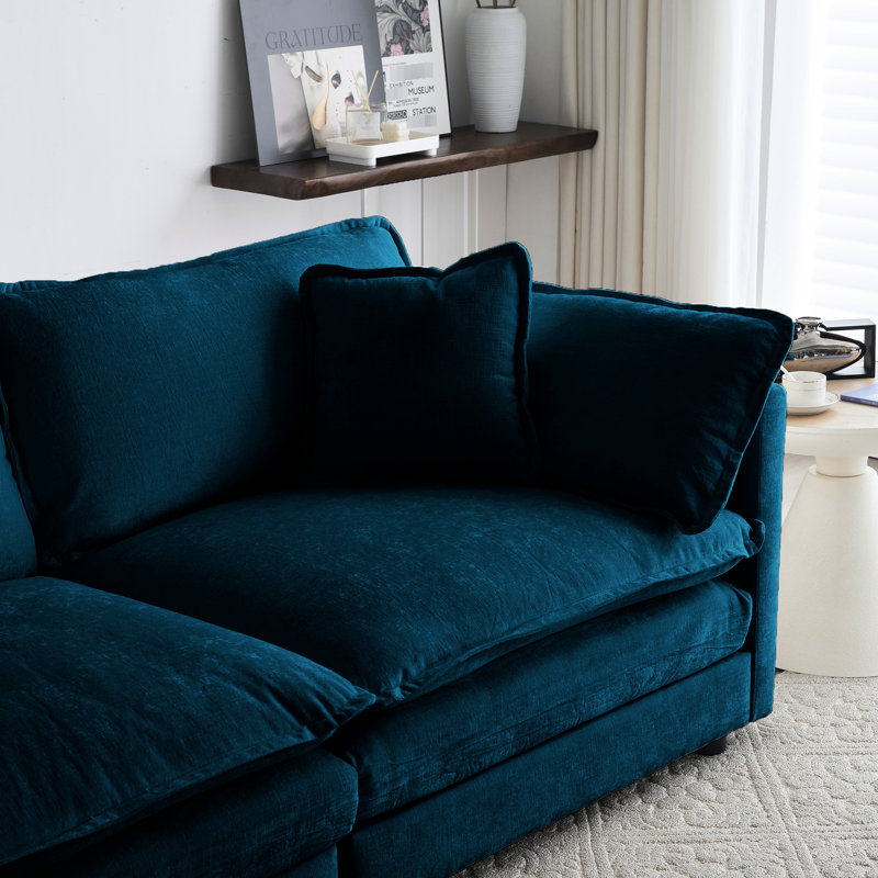 Ensemble de salon 3 pièces en chenille bleue, comprenant 2 fauteuils et 1 table basse, structure en bois, tissu et mousse, pour un luxe raffiné. Mobilier confortable et robuste en chenille, construction solide.