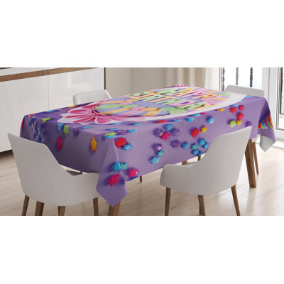 Delicious Birthday Cake on a Table Tablecloth