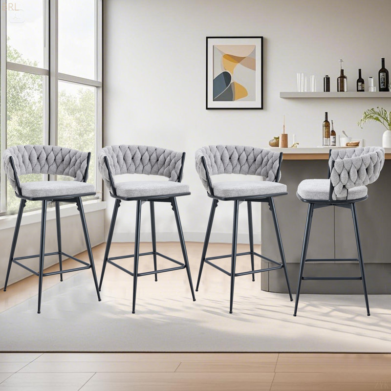 Ensemble de quatre tabourets de bar rotatifs avec coussins en coton et en lin respirants, avec un siège rétro et une structure en fer peint en aérosol noir. Convient aux restaurants et aux bars