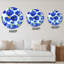 Horloge murale abstraite à fleurs bleues sur fond bleu clair-1987274005