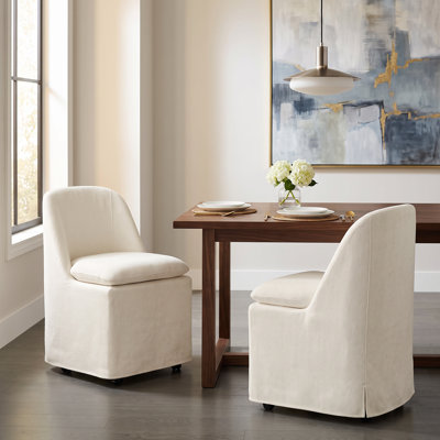 Chaise rembourrée avec housse lavable et roulettes